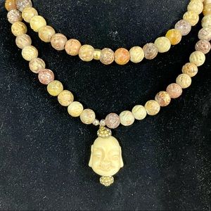 Carved stone Buddha necklace w  carved beads NWOT